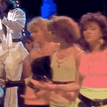 80s dancing girls neon big hair fluorescent