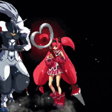 a girl in a red dress is holding a heart shaped object in her hands
