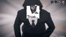 a picture of a man in a suit and tie with the word true on it