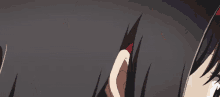 a close up of a girl 's eyes with purple eyes