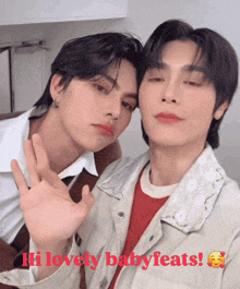 two young men are posing for a picture with the words hi lovely babyfeats