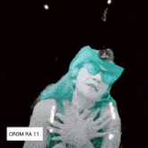 a picture of a woman with green hair and the words crom ra 11