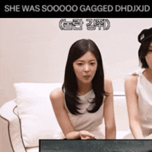 two women sitting on a couch with the caption she was sooooo gagged dhdjxjd