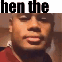 a close up of a man 's face with a caption that says when the hen