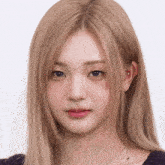 a close up of a woman with blonde hair