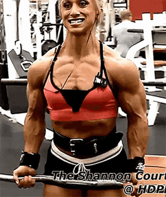 Female Muscle Flex GIF - Female Muscle Flex Biceps - Discover