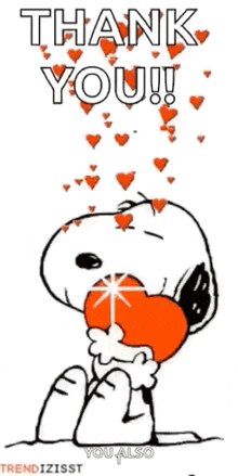 snoopy is holding a heart in his mouth and saying `` thank you ! ''