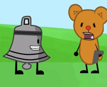 a bell and a teddy bear are standing next to each other in a field