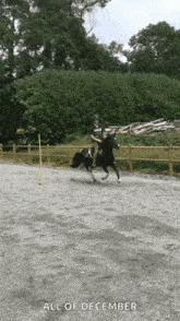 a man is riding a horse in a dirt arena with the words all of december written below him