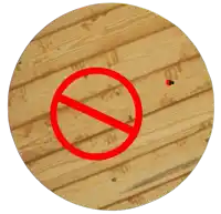 a wooden circle with a red do not enter sign