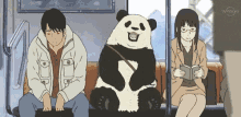 a panda bear sits between two people on a train
