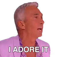a man in a pink jacket says " i adore it "