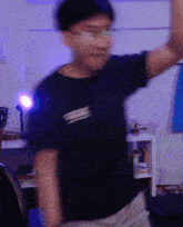 a blurry picture of a person wearing a black shirt