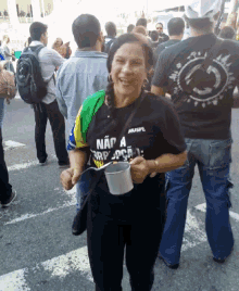 a woman wearing a black shirt that says nao a rp o p o c