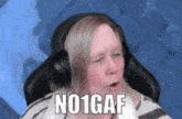 a woman wearing headphones is saying no1 gaf