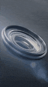 a close up of a camera lens with a circular design
