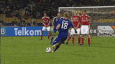a group of soccer players one of whom has the number 17 on their back
