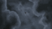 a close up of a cartoon character 's headband with a swirl in the middle