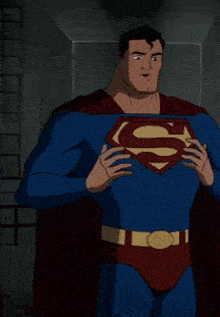 a man in a superman costume holds his chest