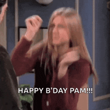 a woman is standing next to a man with her hands in the air and the words `` happy b ' day pam ! ''