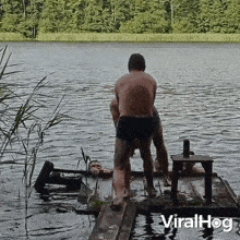 Pushing Him Into The Water Viralhog GIF