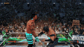 two wrestlers in a ring with a sign that says " my 1st wrestlemania "