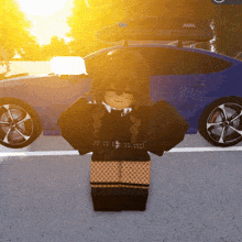 a girl is standing in front of a blue car with a roof box on top