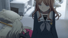 a girl in a sailor uniform stands next to another girl in a bedroom