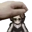a hand is holding a doll 's head in a pixel art .