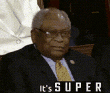 a man in a suit and tie says it 's super .