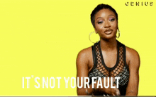 a woman is smiling in front of a yellow background with the words it 's not your fault on it