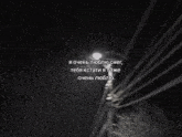 a black and white photo of a tree with russian writing