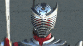 a close up of a person 's helmet and sword
