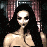 a woman with long black hair is wearing a black dress