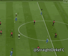 a soccer game is being played on a field with the words straight deke fc on the bottom