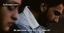 a man and woman are looking at each other and the man says do you know what my real name is .
