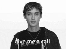 a black and white photo of a young man with the words give me a call
