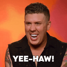 a man in a black shirt says yee haw
