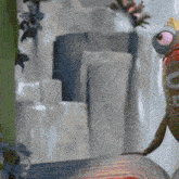a close up of a cartoon character with big eyes looking at something