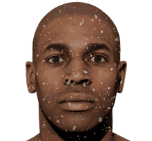 a close up of a man 's face with snowflakes on it