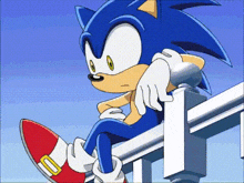 sonic the hedgehog is sitting on top of a fence .