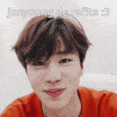 a close up of a young man 's face with the words junyoung de rafita : 3 above him