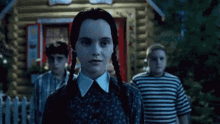 Trying To Smile - Addams Family Values GIF - Addamsfamilyvalues Addamsfamily Smile GIFs