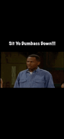 a group of people are standing in a living room with the words sit yo dumbass down written on the bottom