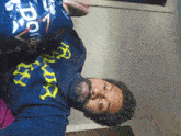 a man is holding a bag of doritos in his hands