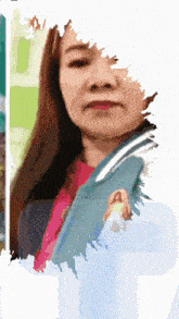 a woman in a blue jacket with a picture of jesus on it