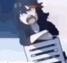 a blurry picture of a person holding a piece of paper and a microphone .