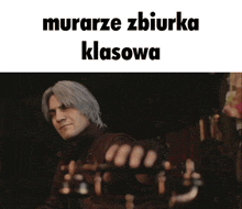 a man holding a guitar with the words murarze zbiurka klasowa written above him