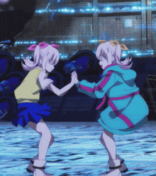 two anime girls are holding hands in front of a building