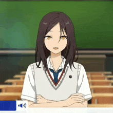 a girl in a school uniform is standing in front of a classroom with her arms crossed .